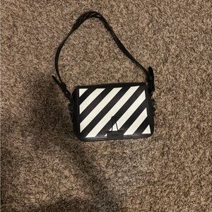 Off-White™ diagonal stripe shoulder/crossbody bag in black.